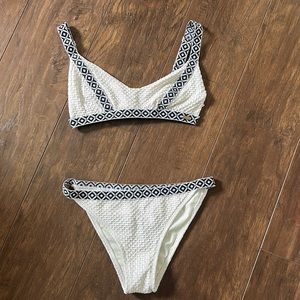 White and black pattern Roxy bathing suit.
